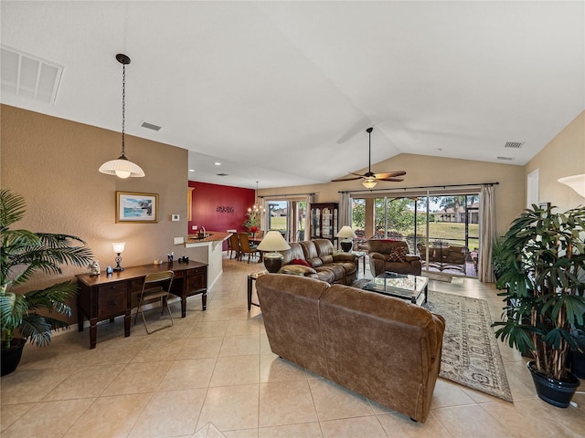 tiled living room featuring ceiling fan and lofted ceiling