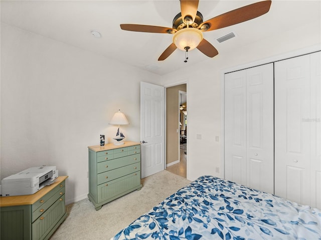 bedroom featuring ceiling fan and a closet