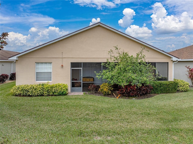 exterior space with a yard