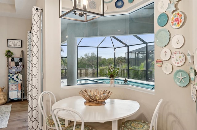 dining area with hardwood / wood-style flooring