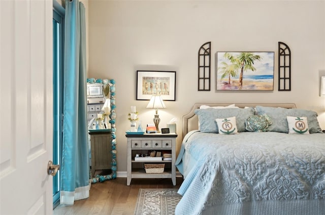 bedroom featuring hardwood / wood-style floors