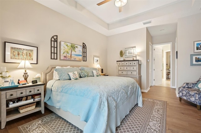 bedroom featuring ceiling fan and wood-type flooring