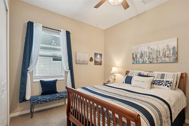 bedroom with ceiling fan, a closet, carpet floors, and multiple windows