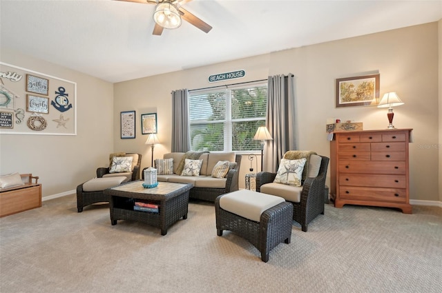 living room featuring ceiling fan and light carpet