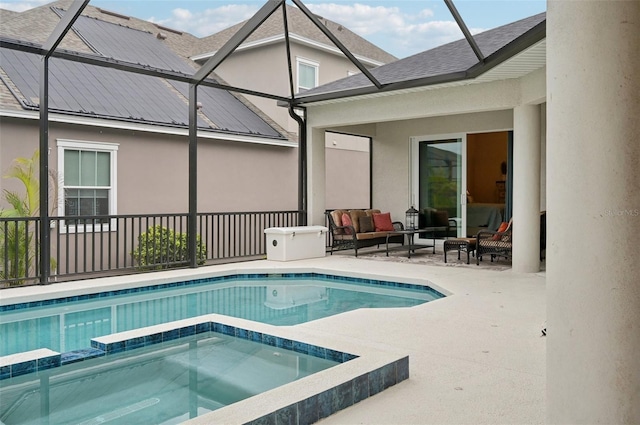 view of swimming pool featuring an outdoor living space, a patio, glass enclosure, and an in ground hot tub