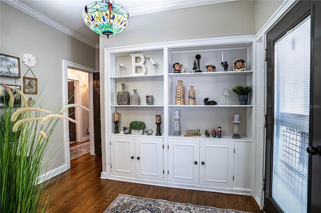 interior space featuring hardwood / wood-style flooring and crown molding