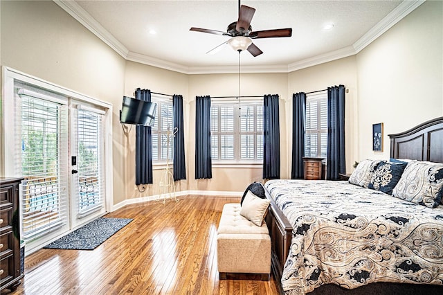 bedroom with ceiling fan, access to exterior, crown molding, and hardwood / wood-style floors