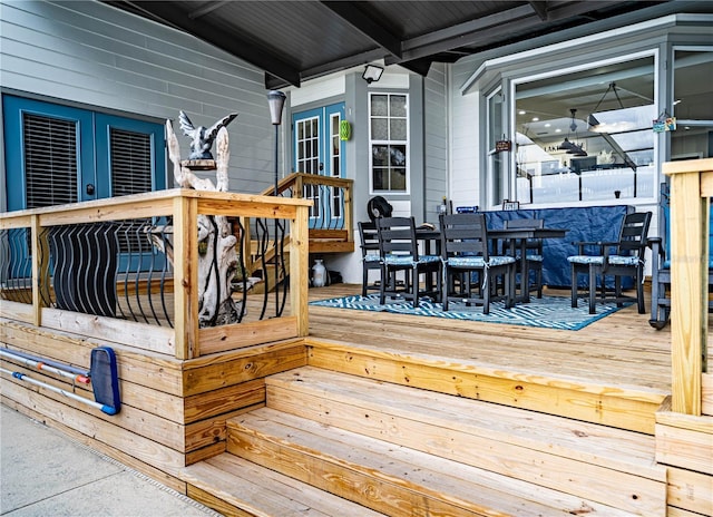 wooden terrace featuring french doors