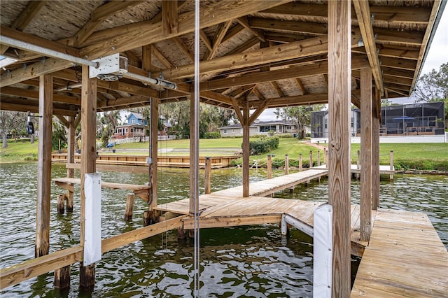 dock area featuring a water view