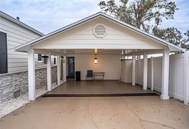 garage featuring a carport