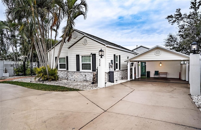 view of front of property with a carport