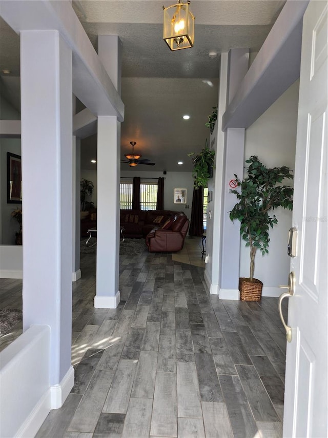 foyer with ceiling fan