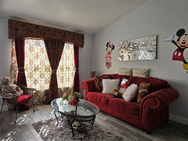 living room featuring vaulted ceiling