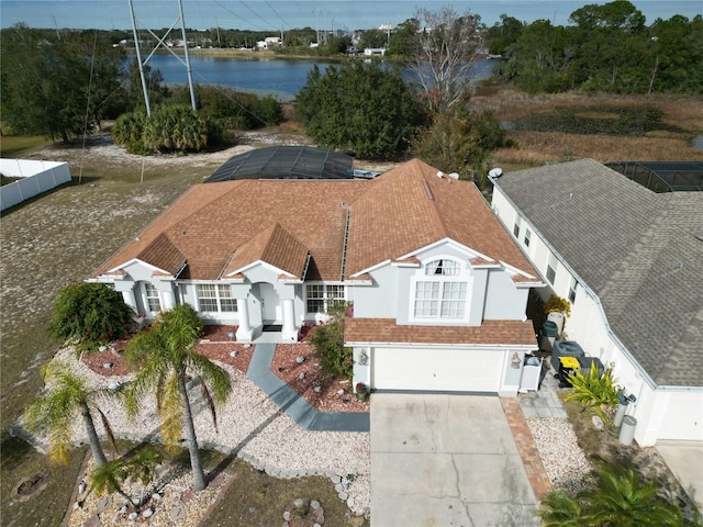 drone / aerial view with a water view