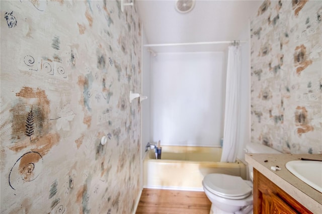 full bathroom featuring toilet, vanity, and shower / bath combo