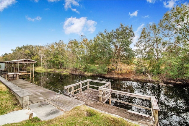 view of dock with a water view