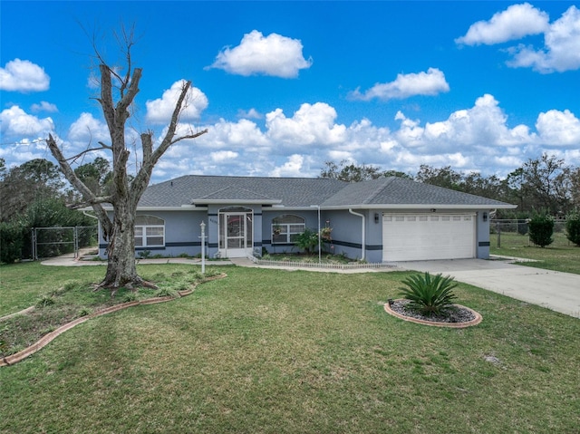 ranch-style home featuring a front yard and a garage