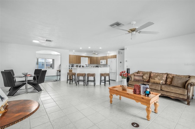 living room featuring ceiling fan