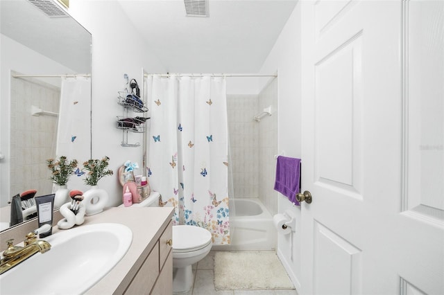 full bathroom with shower / bath combo with shower curtain, tile patterned floors, toilet, and vanity