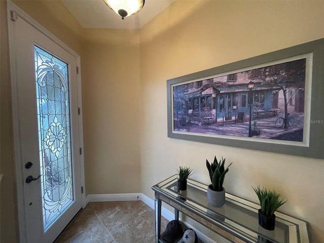 foyer featuring tile patterned floors