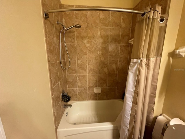 bathroom featuring shower / bath combination with curtain