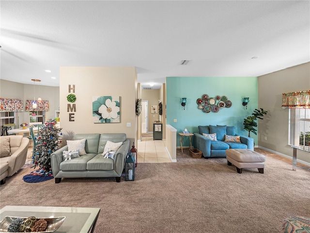 living room featuring light colored carpet