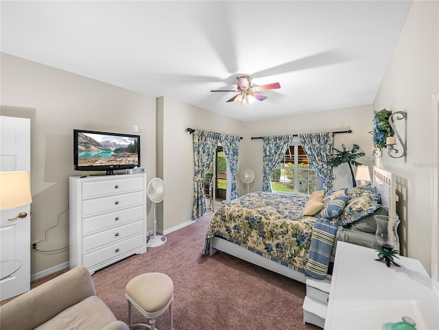 carpeted bedroom featuring ceiling fan and access to outside