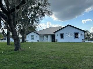 view of front of property with a front lawn