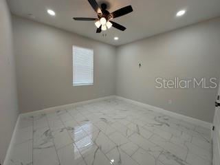 empty room with ceiling fan