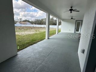 view of patio with ceiling fan