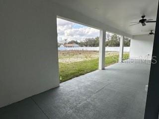 view of patio / terrace featuring ceiling fan