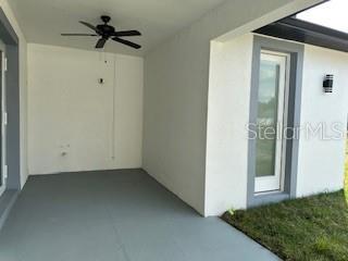 view of patio / terrace featuring ceiling fan