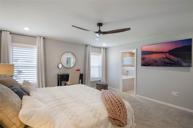 bedroom with carpet flooring, ceiling fan, and ensuite bathroom