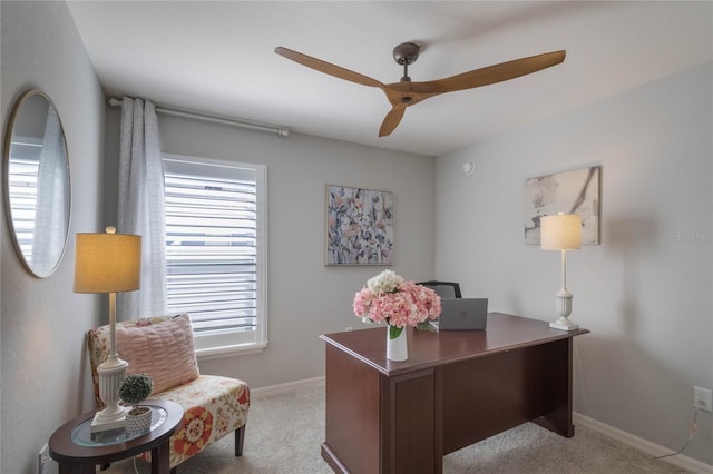 carpeted office with ceiling fan