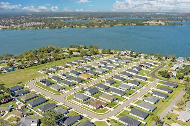 bird's eye view with a water view