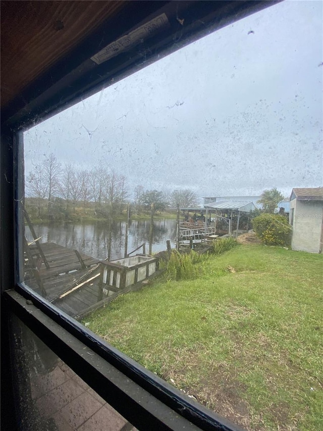 view of water feature with a dock