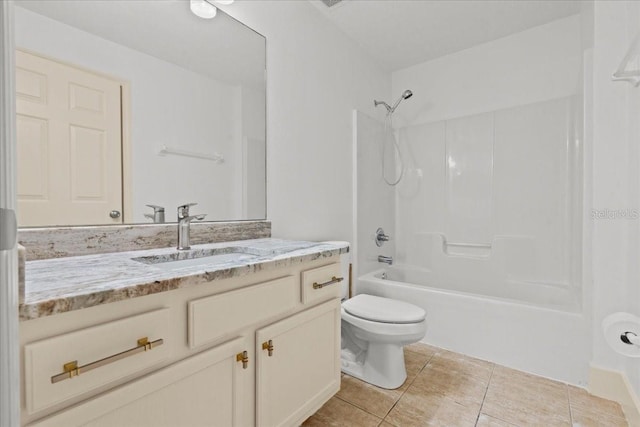 full bathroom with tile patterned floors, vanity, toilet, and shower / washtub combination