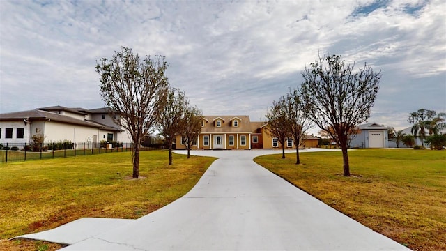 view of home's community featuring a yard