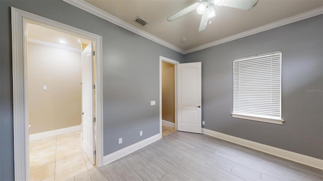 unfurnished bedroom with ceiling fan, crown molding, and light hardwood / wood-style floors