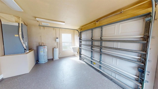 garage with heating unit and electric water heater