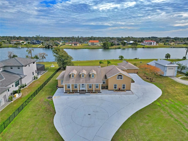 drone / aerial view featuring a water view