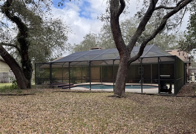 pool featuring glass enclosure