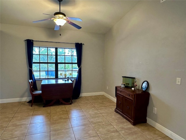 office space featuring ceiling fan and light tile patterned flooring