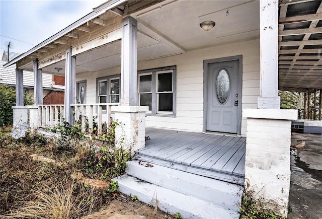 entrance to property with covered porch