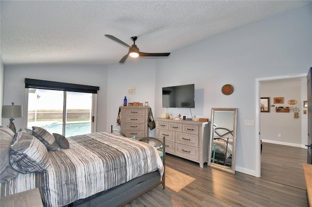 bedroom with lofted ceiling, access to exterior, a textured ceiling, and ceiling fan