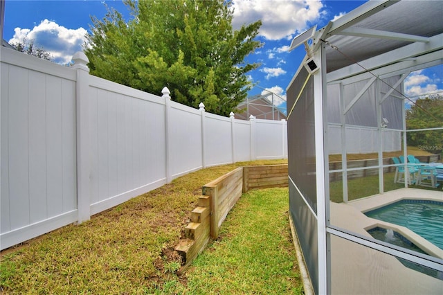 view of yard featuring a fenced in pool