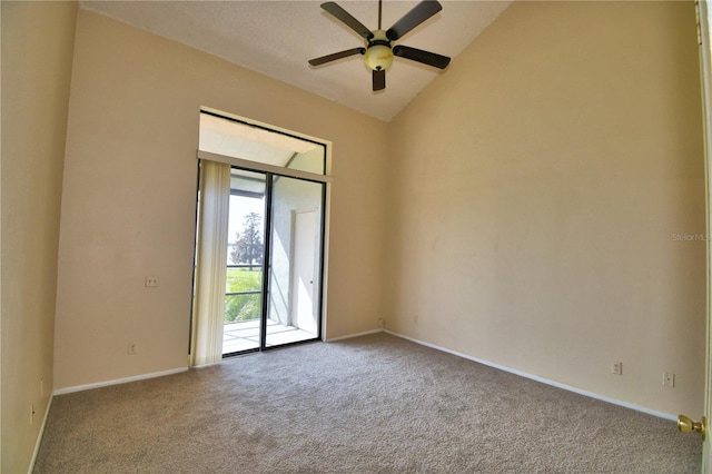 carpeted empty room with lofted ceiling and ceiling fan