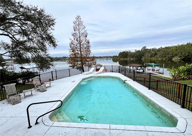 view of pool with a water view