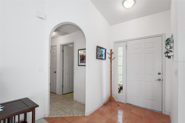 view of tiled foyer entrance