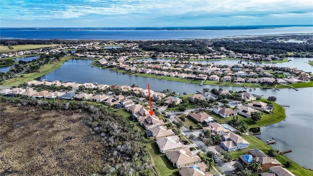 drone / aerial view featuring a water view